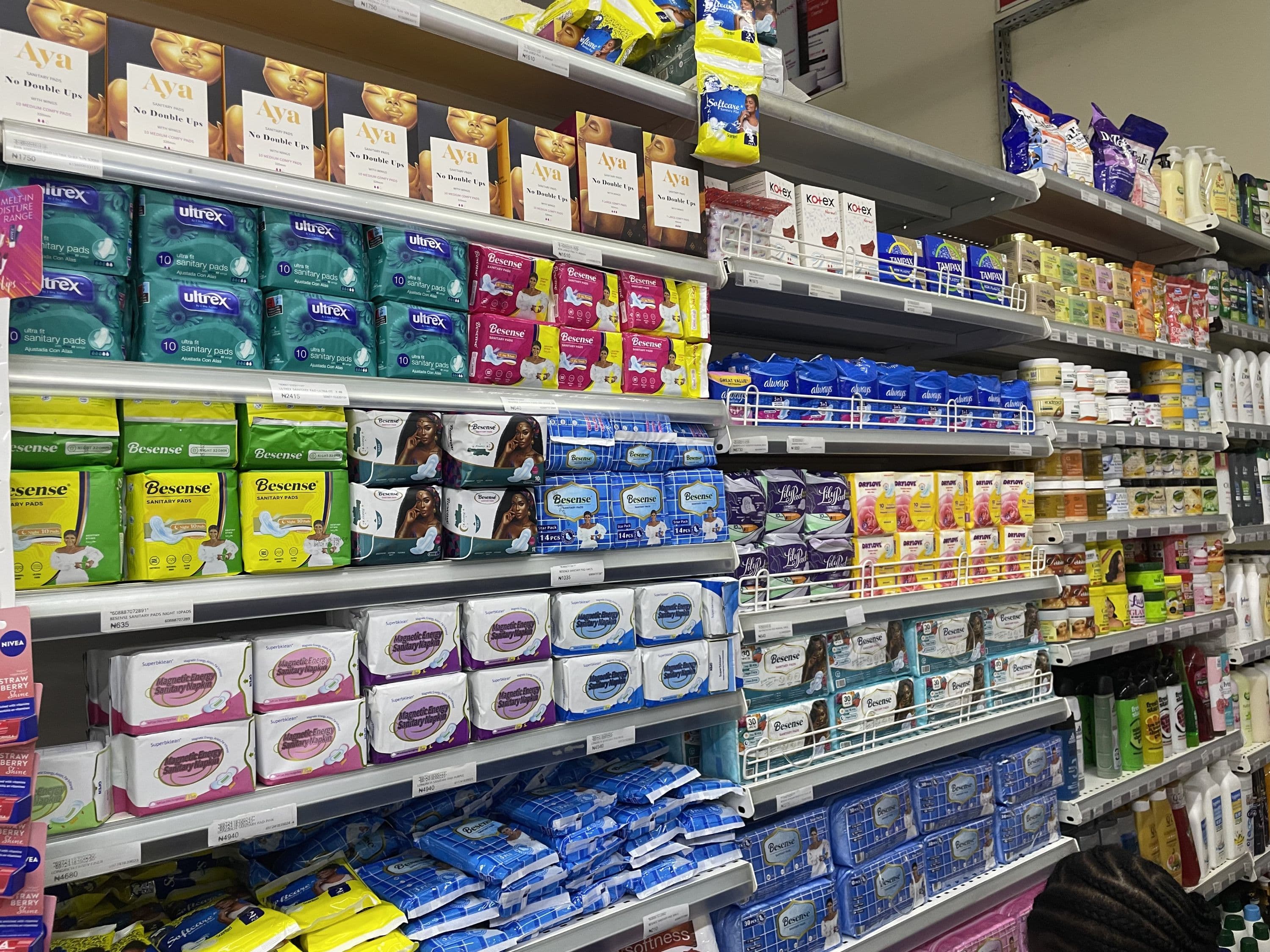 Sanitary pads arranged on a store shelf